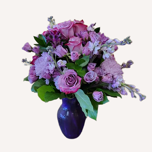 Purple roses and flowers arrangement