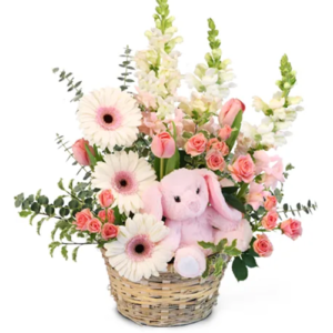 Tiny pink blessing basket of flowers