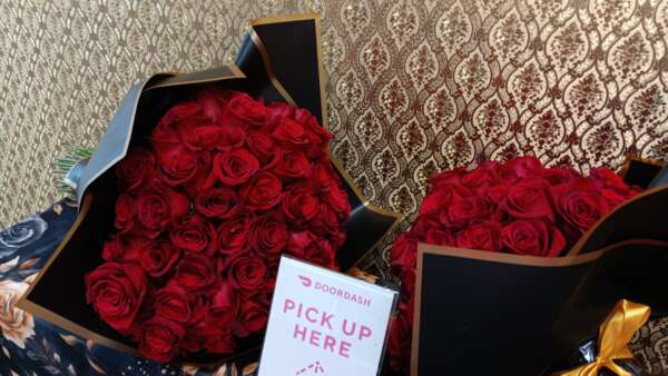 25 LARGE red rose wrapped bouquet